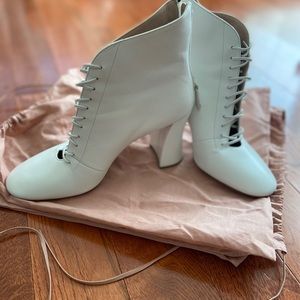 Miu Miu white lace-up booties